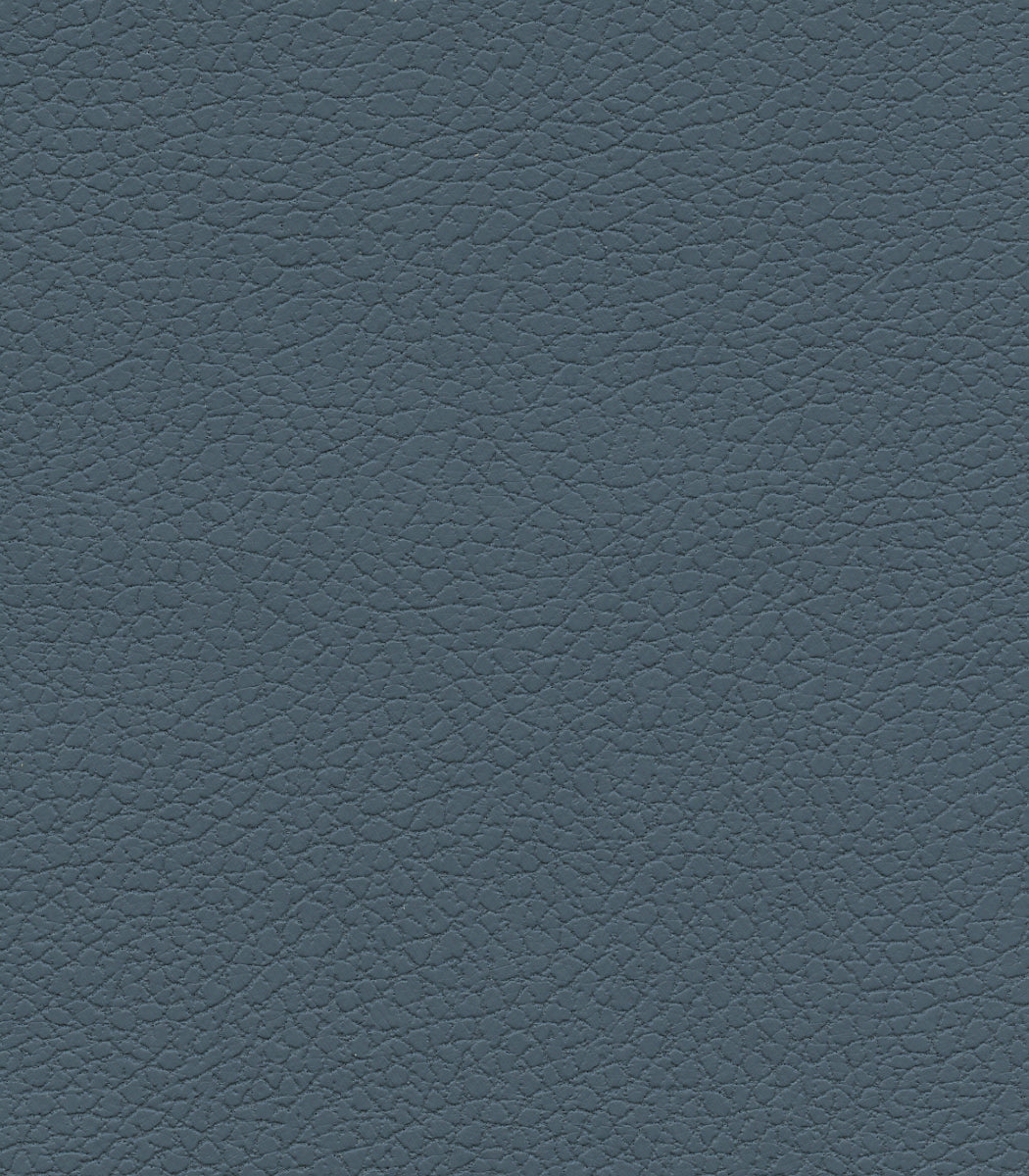 Close-up of dark blue leather texture on the Golden Tech PR527 Cloud Recliner With Lift Assist & Twilight, highlighting fine, natural-looking grain and subtle wrinkles across the surface.